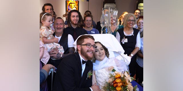 Family joined staff to watch the couple say "I do."