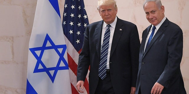 US President Donald Trump (L) arrives at the Israel Museum to speak in Jerusalem on May 23, 2017, accompanied by Israeli Prime Minister Benjamin Netanyahu.