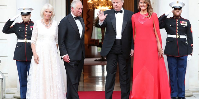 Donald and Melania Trump greet Prince Charles and Camilla.