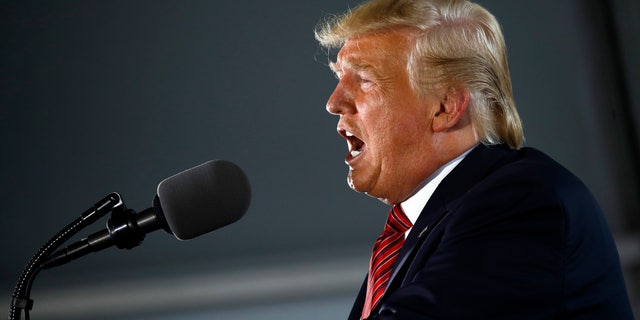 President Donald Trump speaks at Southwest Iowa Renewable Energy in Council Bluffs, Iowa, on Tuesday. (Associated Press)