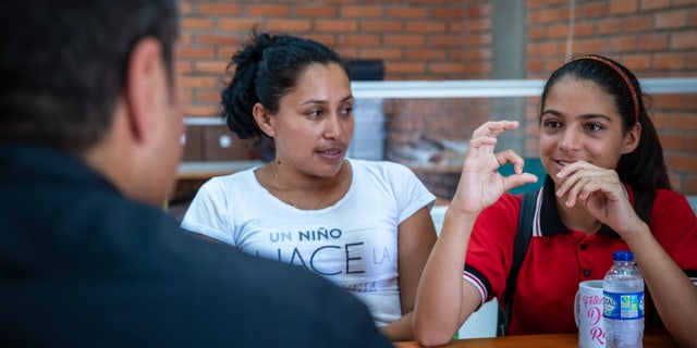 Jheyde Yepez, 13, speaks to World Vision U.S. President Edgar Sandoval Sr. about her experience fleeing Venezuela and settling in Colombia. Jheyde used to beg on the streets, now thanks to World Vision she is able to attend school and is hoping to start her own business in English translation.