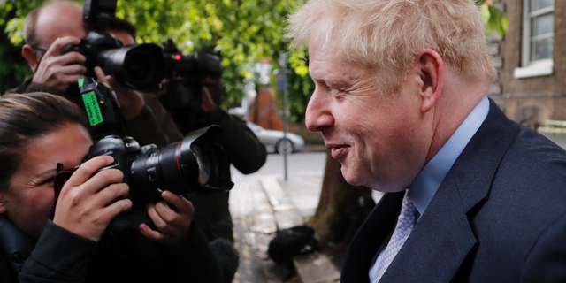 British Conservative Party lawmaker Boris Johnson leaves his home in London, Tuesday, June 11, 2019. Britain's Conservative Party is holding an election to replace Prime Minister Theresa May, who resigned last week after failing to lead Britain out of the European Union on schedule. Former Foreign Minister Boris Johnson is currently the bookies favorite to replace May. (AP Photo/Frank Augstein)