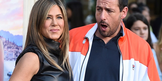 Cast members Jennifer Aniston and Adam Sandler arrive at the Los Angeles premiere of "Murder Mystery" at the Regency Village Theatre on Monday, June 10, 2019 in Westwood, Calif. (Photo by Jordan Strauss/Invision/AP)