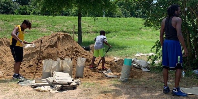 "Sandbagging parties" are underway across Arkansas