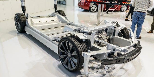 The Model S and X, pictured above, use a floor-mounted battery pack.