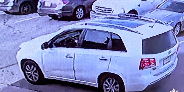 Investigators were looking for the gunman who was seen driving away in a 2006 white Kia Sportage SUV with paper plates.