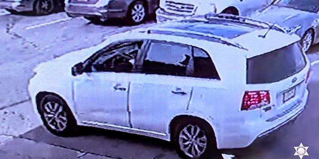 Investigators were looking for the gunman who was seen driving away in a 2006 white Kia Sportage SUV with paper plates.