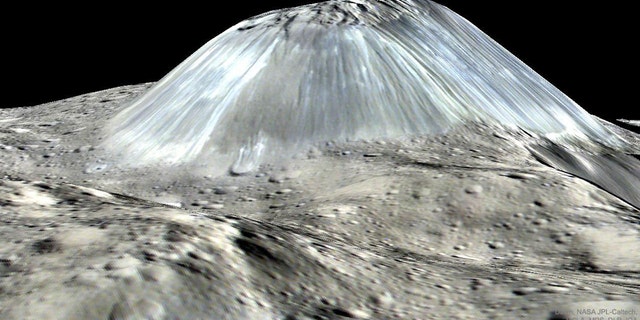 Unusual Mountain Ahuna Mons on Asteroid Ceres (Credit: Dawn Mission, NASA, JPL-Caltech, UCLA, MPS/DLR/IDA)