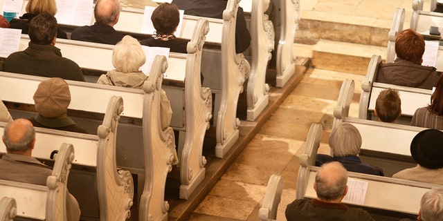 People Praying in a church