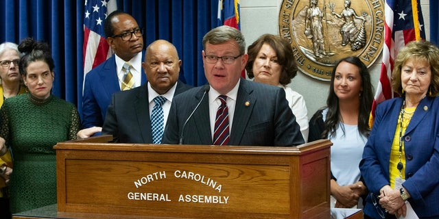 North Carolina House Speaker Tim Moore, a Republican, heads a press conference extolling 