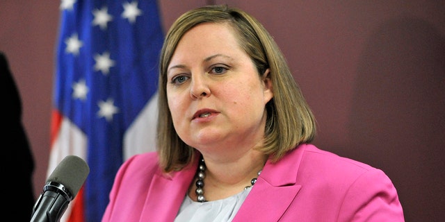 Erin Deveney, shown in 2014, resigned as head of the motor vehicle division in Massachusetts after it was determined that Volodymyr Zhukovskyy's commercial driving license should have been suspended prior to a horrific deadly crash in June. (Associated Press)