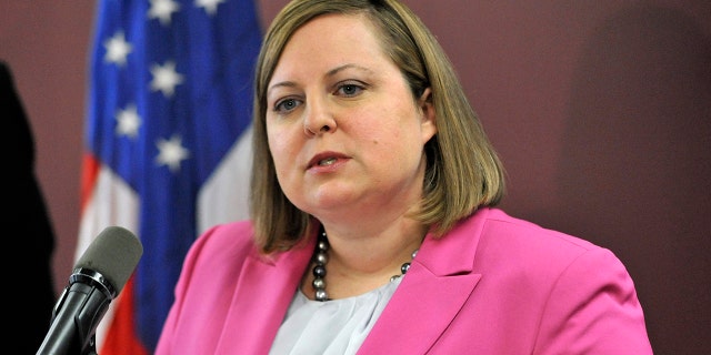 Erin Deveney, shown in 2014, resigned as head of the motor vehicle division in Massachusetts after it was determined that Volodymyr Zhukovskyy's commercial driving license should have been suspended prior to a horrific deadly crash in June. (Associated Press)