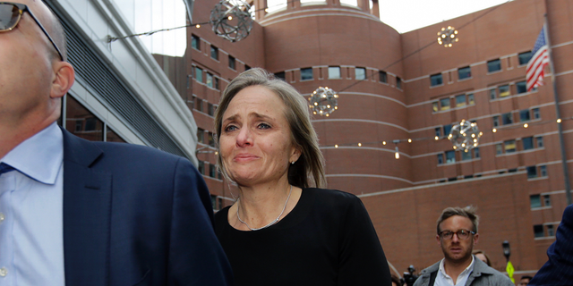 District Court Judge Shelley M. Richmond Joseph departs federal court, April 25, 2019, in Boston after facing obstruction of justice charges for allegedly helping a man in the country illegally evade immigration officials as he left her Newton, Mass., courthouse after a hearing in 2018. (Associated Press)