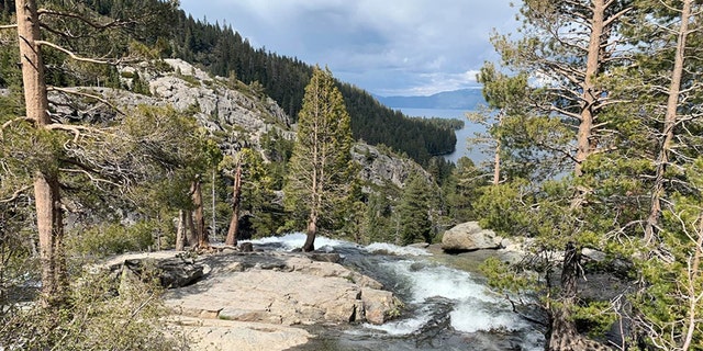 Woman taking photos dies in plunge off California waterfall