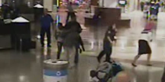 A female traffic control police officer quickly intervened, sprinting across Hartsfield-Jackson to help stop the abduction attempt.