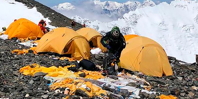 This May 2019, photo provided by climber Dawa Steven Sherpa shows Camp Four, the highest camp on Mount Everest littered with abandoned tents.