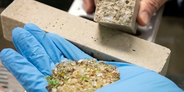 Australian researchers have discovered that old ground glass can be used to make polymer concrete, which can be used for roads and carparks. (Credit: SWNS)