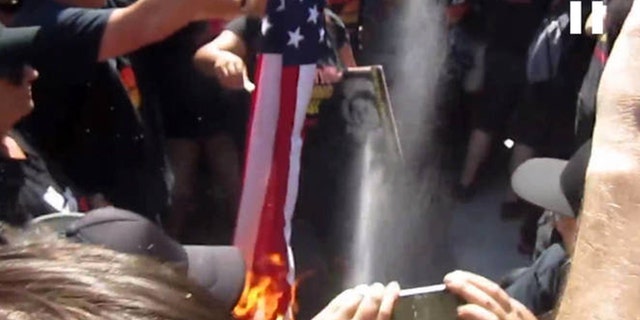 Image taken from video of flag burning protest that led to arrest of Gregory "Joey" Johnson.