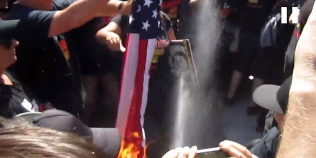 Image taken from video of flag burning protest that led to arrest of Gregory "Joey" Johnson.