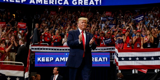 President Donald Trump arrives to speak at his re-election kickoff rally at the Amway Center, June 18, 2019, in Orlando, Florida. (AP Photo/Evan Vucci)