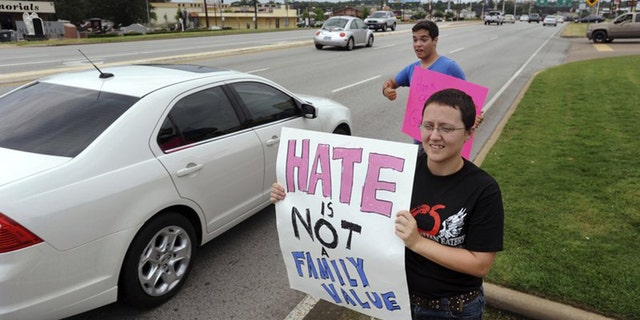Texans holding placards supporting gay marriage outside a Chick-fil-A in Tyler, in 2012. 