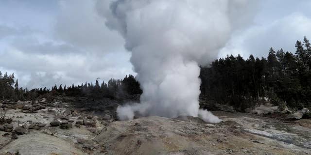 A USGS image shows steam rising from Steamboat Geyser after an earlier eruption.