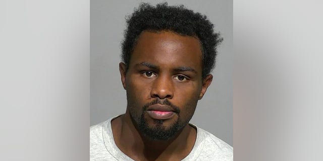 Kenta Evans, 21, allegedly killed a 2-month-old boy by punching him in the head "multiple times with closed fists."