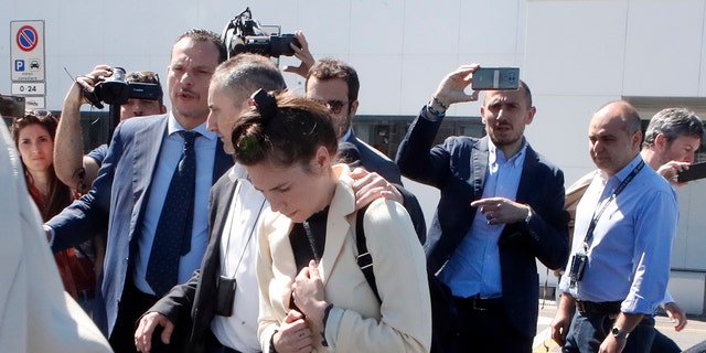 Amanda Knox is approached by a journalist upon her arrival in Linate airport Milan Italy Thursday