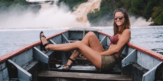 One 21-year-old American woman, pictured, has achieved an unbelievable feat that many only dream of – visiting every country on earth.
