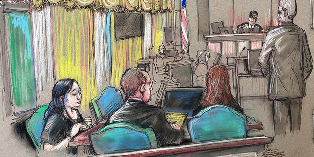 In this April court sketch, Yujing Zhang, left, a Chinese woman charged with lying to illegally enter President Donald Trump's Mar-a-Lago club, listens at a hearing in West Palm Beach, Fla.
