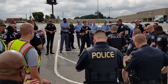 Law enforcement in Georgia posed as construction workers Wednesday to seek drivers on their phones or not wearing a seat belt near a busy intersection. (Marietta Police Department)
