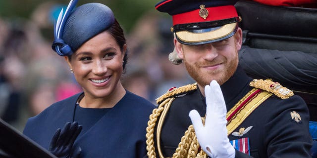 Prince Harry, Duke of Sussex and Meghan, Duchess of Sussex ride by carriage down the Mall during Trooping The Colour, the Queen's annual birthday parade, on June 08, 2019, in London, England. (Photo by Samir Hussein/Samir Hussein/WireImage)