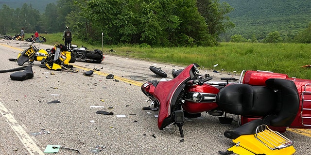 This photo provided by Miranda Thompson shows the scene where several motorcycles and a pickup truck collided on a rural, two-lane highway Friday, in Randolph, N.H. (AP/Miranda Thompson)