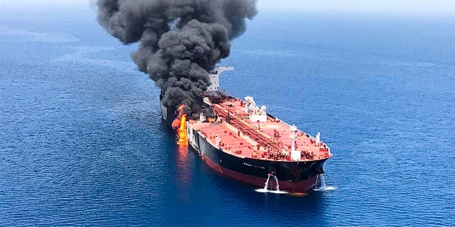 An oil tanker is on fire in the sea of Oman, Thursday, June 13, 2019. Two oil tankers near the strategic Strait of Hormuz were reportedly attacked on Thursday, an assault that left one ablaze and adrift as sailors were evacuated from both vessels and the U.S. Navy rushed to assist amid heightened tensions between Washington and Tehran.