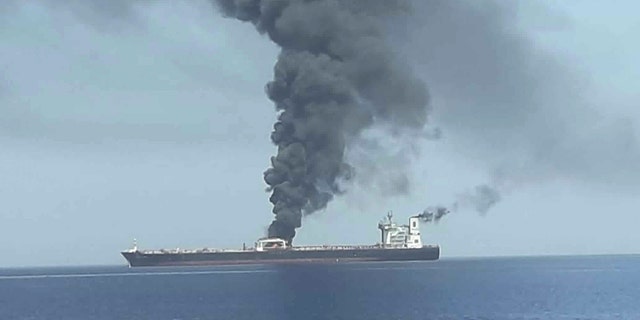 In this photo released by state-run IRIB News Agency, an oil tanker is on fire in the sea of Oman, Thursday, June 13, 2019. Two oil tankers near the strategic Strait of Hormuz have been reportedly attacked. The alleged assault on Thursday left one ablaze and adrift as sailors were evacuated from both vessels. The U.S. Navy rushed to assist amid heightened tensions between Washington and Tehran.