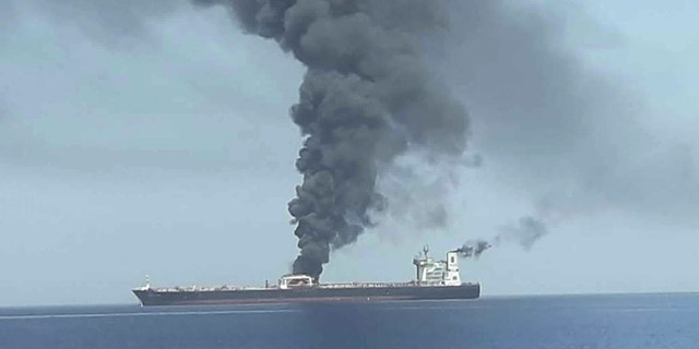 In this photo released by state-run IRIB News Agency, an oil tanker is on fire in the sea of Oman, Thursday, June 13, 2019. Two oil tankers near the strategic Strait of Hormuz have been reportedly attacked. The alleged assault on Thursday left one ablaze and adrift as sailors were evacuated from both vessels. The U.S. Navy rushed to assist amid heightened tensions between Washington and Tehran.