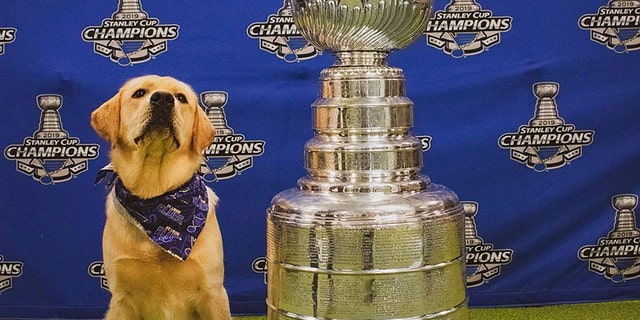 Barclay poses with Stanley Cup.