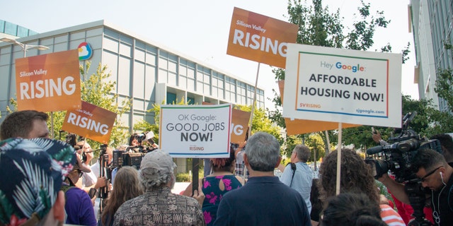 Demonstrators are seen outside of Google's shareholder meeting this week in Mountain View, California.