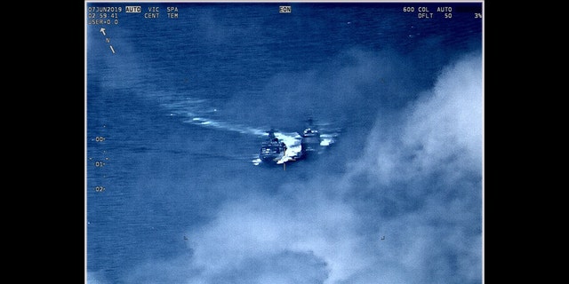 A still image of the incident released by the Department of Defense shows both ships clearly side by side