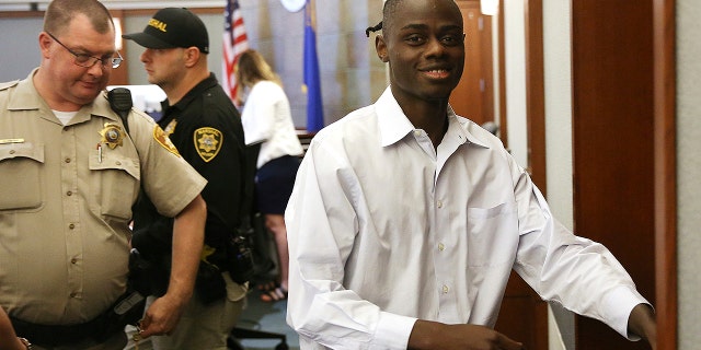Weslie Martin, accused of burglarizing Wayne Newton's home, is escorted out of the courtroom following his hearing at the Regional Justice Center in Las Vegas, Friday, June 21, 2019. A Nevada jury found martin, a 22-year-old state prison inmate guilty of burglarizing the mansion of