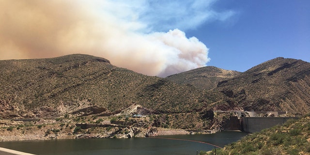 The Woodbury Fire began on June 8 in the Tonto National Forest near Roosevelt Lake and has since forced the evacuation of about 700 homes as the human-caused wildfire has grown over 100 square miles.