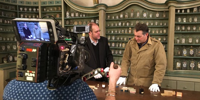 Inside the German Pharmacy Museum, James Holland meets with medical historian, Dr. Peter Steinkamp of Ulm University. (Credit: Courtesy of Brave Planet Films)