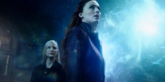 This image released by Twentieth Century Fox shows Sophie Turner and Jessica Chastain, left, in a scene from