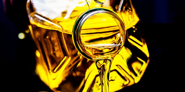 Federal prosecutors have charged 21 people part of an alleged conspiracy to steal used cooking oil, known as 