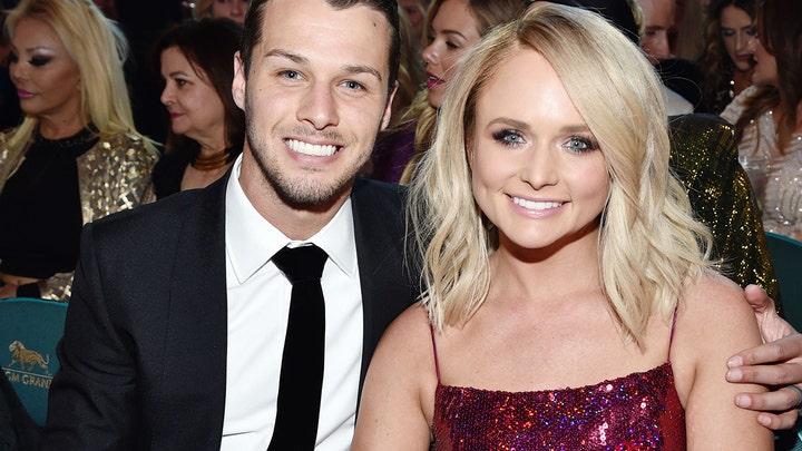 Miranda Lambert, husband Brendan McLoughlin display PDA on 2019 ACM Awards red carpet