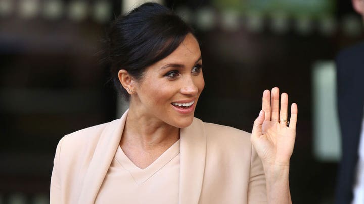 Meghan Markle makes first public appearance after stepping back from royal family