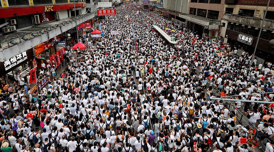 Several hundred thousand people took to the streets in Hong Kong on Sunday night to protest a new extradition law that would allow China to extradite suspects from the city.