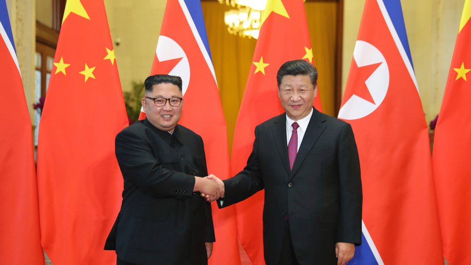 China's Xi leaves for first state visit to North Korea