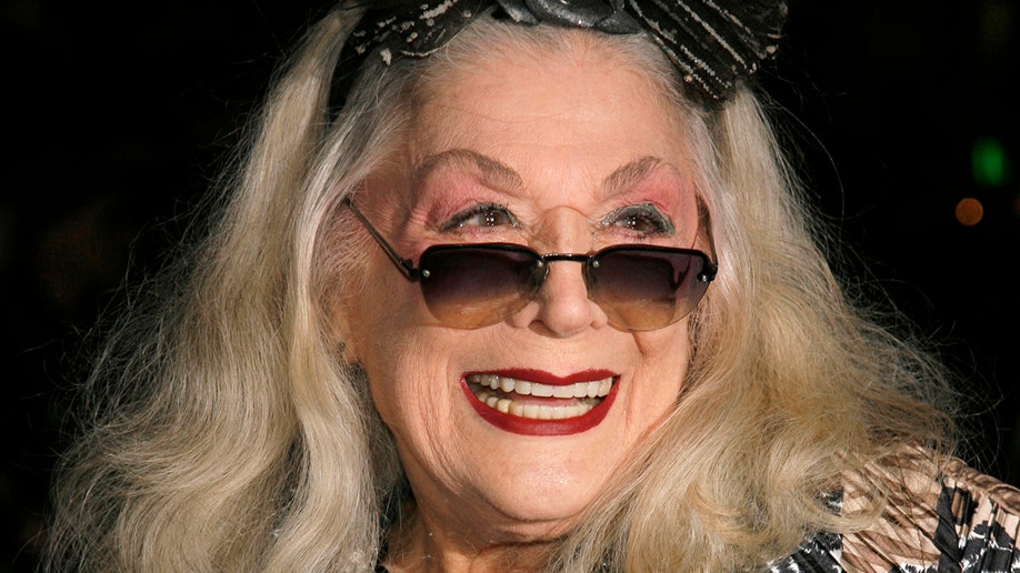 FILE - In this Sunday, Jan. 7, 2007, file photo, Sylvia Miles arrives for the 2006 New York Film Critic's Circle Awards at the Supper Club in New York. Miles, whose brief appearances in “Midnight Cowboy” and “Farewell, My Lovely,” earned her two Academy Award nominations, died Wednesday, June 12, 2019. Miles was also a scene-stealing character of the New York party scene, beloved for her outgoing personality and flamboyant fashion sense. (AP Photo/Rick Maiman, File)