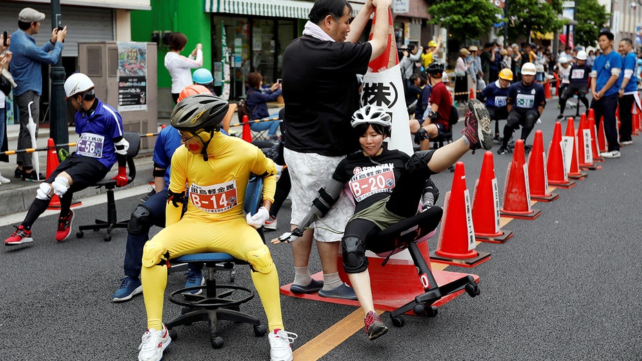 Japanese Racers Grab Chairs To Face Off In Office Grand Prix